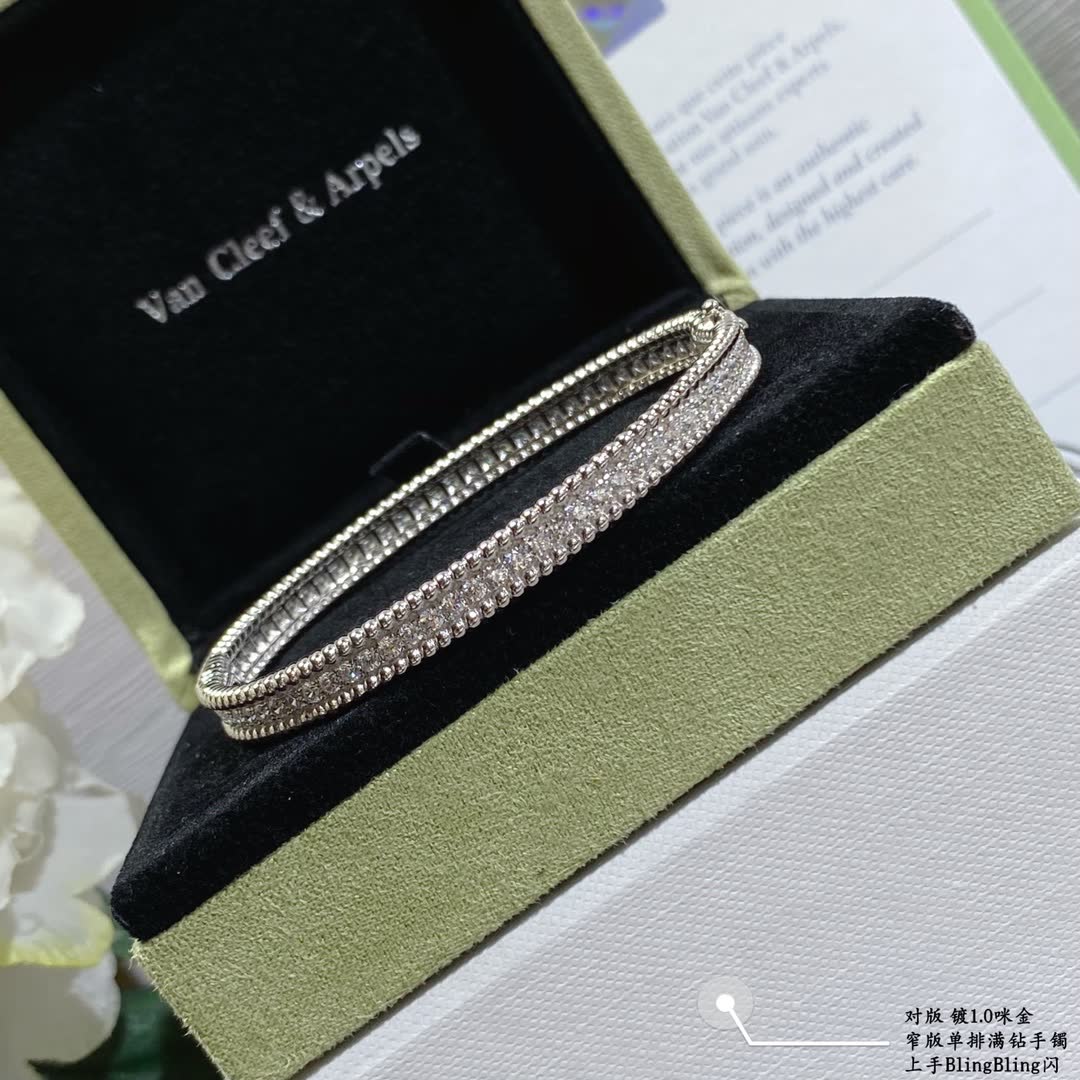 Van Cleef & Arpels Silver Diamante Flower Bangle Set